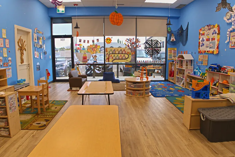 Bright blue classroom looking out to the front windows